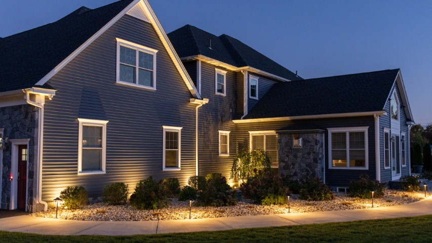 Lit stone walkway at dusk
